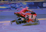 Rossi Stoner racing photos crash laguna Seca MotoGP