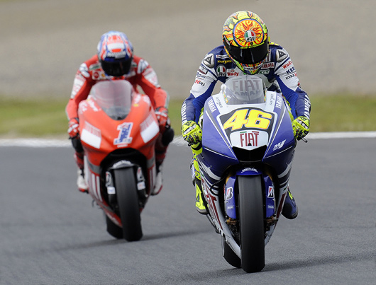 Rossi Stoner race action phto Motegi motoGP